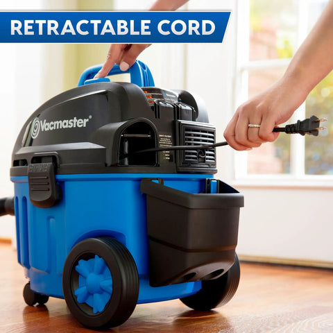4 Gallon Wet Dry Vacuum With 5 Peak HP Two Stage Industrial Motor Workhorse Shop Vacuum, blue body, retractable cord in use.