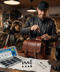 Man using screwdriver on brown leather bag with Heavy Duty Black Chicago Screws Kit For Leather Crafts, 115 Piece Set beside him.