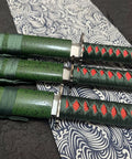 Close-up of 3-Piece Samurai Sword Set With Stand Green Scabbard Katana Wakizashi Tanto 1095 Carbon Steel Unsharpened Blades