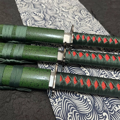 Close-up of 3-Piece Samurai Sword Set With Stand Green Scabbard Katana Wakizashi Tanto 1095 Carbon Steel Unsharpened Blades