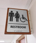 Modern Restroom Sign For Business That Keeps It ADA Compliant With Braille Grade 2 Raised Icons Easy Install Brushed Aluminum Door Sign 6 Inch Wide By 8 Inch High Contemporary Look For Any Space