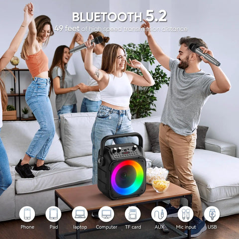 Group enjoying Totally Party-Ready Portable Bluetooth Karaoke System with two wireless mics and LED lights at home party