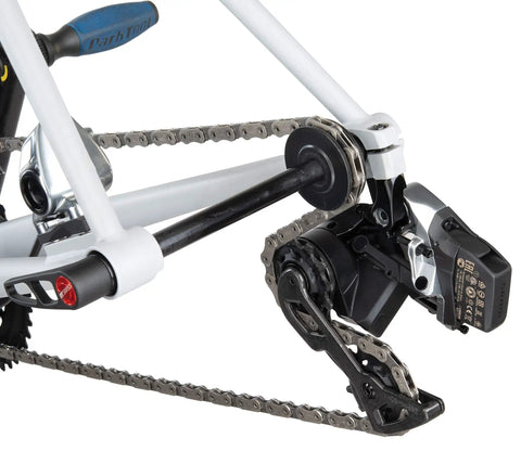 Close-up of DH-1 Dummy Hub for Rear Dropouts No-Fuss Chain Cleaning And Transport Solution in a bike frame, black color.