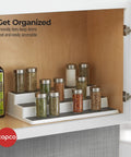 Sleek Three Tier Cabinet Organizer That Straight Up Fixes Pantry Chaos, Non Skid Storage Rack For Spices Seasonings And Canned Goods, White Gray Kitchen Shelf with tiered jars.