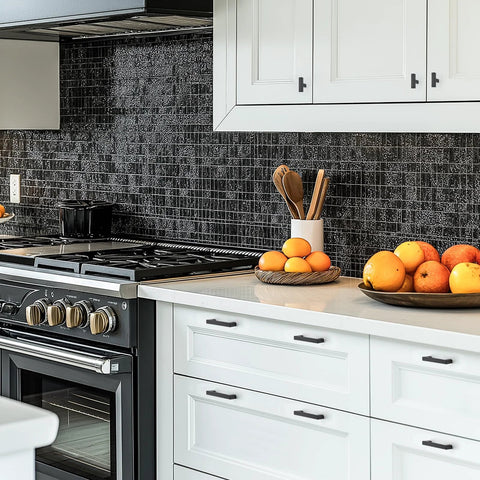 Modern kitchen with white cabinets featuring 2 Pack Black Cabinet Knobs 2 Inch Overall Length Single Hole Drawer Handles Matte Black Finish