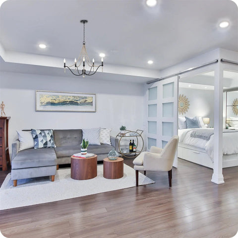 Living room with Boho Chic 28 Inch Five Light Wood Beaded Chandelier In Black And Antique White Finish Farmhouse Vibe
