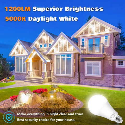 Outdoor Dusk To Dawn LED Light Bulbs 11W Auto On Off Sensor Daylight 5000K A19 with E26 Base illuminating a house exterior at night
