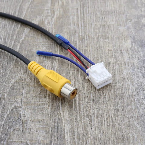 Close-up of Four Pack 10Pin Car Reversing Camera Cable Adapter showing yellow RCA connector and 10-pin plug