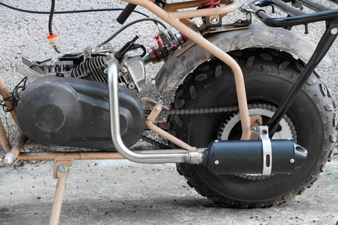 Beefed Up Performance Exhaust Muffler Silencer For Predator 212 196cc GX160 420cc engines installed on a mini bike