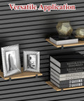 Slatwall display with multiple shelves holding books and decor items using 12 Inch Black Slatwall Shelf Brackets Set Of 18 Heavy Duty Metal Slatwall Hooks And Display Hangers For Garage, Retail And Storage Organization, Easy Install, Durable And Stable For Heavy Items
