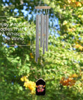 Mask Inspired Hawaiian Flowers Wind Chimes With Six Tuned Aluminum Tubes For Outdoor Decor Garden Patio Balcony Good Vibe Weatherproof Aluminum Build With Wooden Tags And Sturdy Hangers hanging against leafy background.