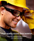 Close-up of a worker wearing Armor Smart Safety Glasses for Men and Women With TR90 Frame, Bluetooth, and open-ear speakers.