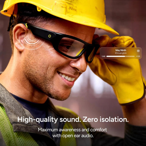 Close-up of a worker wearing Armor Smart Safety Glasses for Men and Women With TR90 Frame, Bluetooth, and open-ear speakers.
