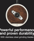 Close-up of Fresh Grind Electric Coffee Grinder for 12 cups with stainless steel blades and ground coffee visible inside.