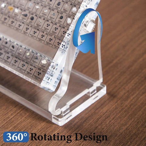 Cool Clear Acrylic Periodic Table With Real Elements Inside Size 6.7 By 4.7 Inches showing rotating design on a wooden table