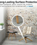 Room with brick wall featuring chair and table on felt pads, highlighting 3 Inch Round Reusable Felt Furniture Sliders For Hard Floors.