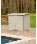 Huge Horizontal Resin Outdoor Storage Shed With Floor 5 By 4 Feet Weather Resistant Beige Brown by the poolside.