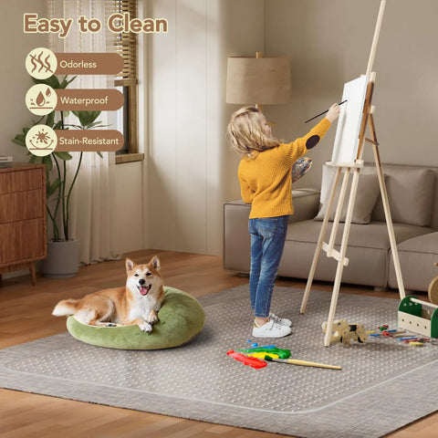 Child painting on easel in living room with dog on floor, showcasing waterproof and stain-resistant features of modern rug.