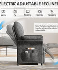 Side view of dark grey power recliner chair with heat, massage, 180 degree lay flat, 3 side pockets, in a living room.