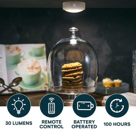 Six Pack Stick On Puck Lights With Remote Controlled DIY LED Under Cabinet Lighting illuminating cookies on a counter