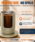 Gotta Have This Self Stirring Heated Coffee Mug With 10 Oz Auto Magnetic Mixing Cup Sage Green on a desk showing mixing indicators.