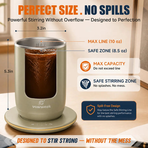 Gotta Have This Self Stirring Heated Coffee Mug With 10 Oz Auto Magnetic Mixing Cup Sage Green on a desk showing mixing indicators.