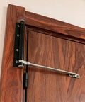 Heavy Duty Stainless Steel Door Closer For Home Use with safety spring on wooden door, installed with easy screws and wrench.