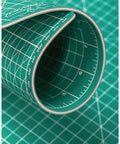 Rolled green Beefed Up Super Dense 24 By 36 Inch Large Self Healing Rotary Cutting Mat For Sewing Crafts And Hobby Projects A1 Size