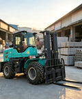 Top Shelf Heavy Duty Telehandler And Telescopic Forklift Built As A 4WD Off Road Workhorse with fork attachments in warehouse.