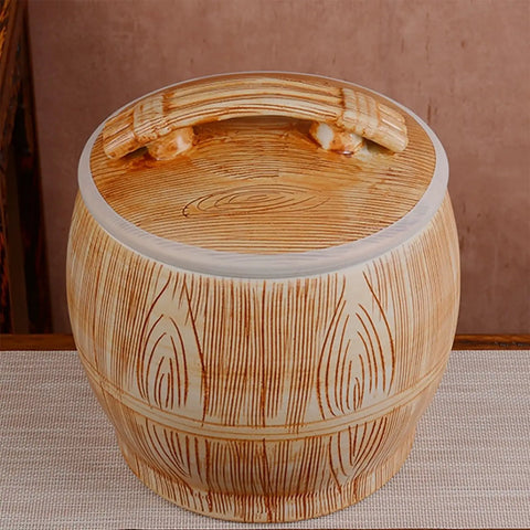 Handpainted Ceramic Rice Dispenser With Secure Airtight Lid, Heavy Duty Kiln Fired Grain Jar And All Purpose Kitchen Canister For Snacks Coffee Beans Candy seen from top view.