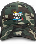 Front view of camo unisex cotton baseball hat trucker cap with yacht graphic, breathable dad hat for golf and casual wear.