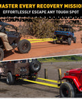 Beefed Up 3 Inch By 30 Foot Tow Strap Recovery Kit With Two Three Quarters Inch D Ring Shackles in action on off-road vehicles