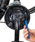 Using crank puller tool on bike crankset, fits 22mm x 1 threads and square taper bottom brackets, SRAM Power Spline with 8mm bolt.