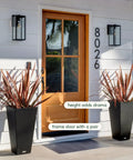Indoor Outdoor Taper Planter Set Of 2 Dope 30 Inch Black Plastic Resin Planters For Patios Entrances And Railings at doorway