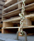 Binder Chain With Clevis Grab Hooks Grade 70 5 16 Inch 20 Foot Heavy Duty Tie Down securing pallets on a flatbed