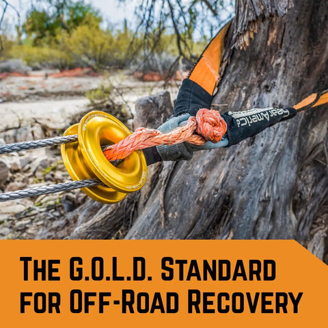 G.O.L.D. Snatch Recovery Ring for Off Road Recovery, 48,000 Lbs MBS connected to winch line and tree in rough terrain