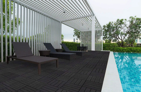 Interlocking Deck Tiles Waterproof Outdoor Flooring 12x12 Inches Gray 27 Piece Set by poolside with lounge chairs