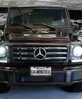 Front view of luxury SUV with Quebec license plate, showcasing elegant design and headlights
