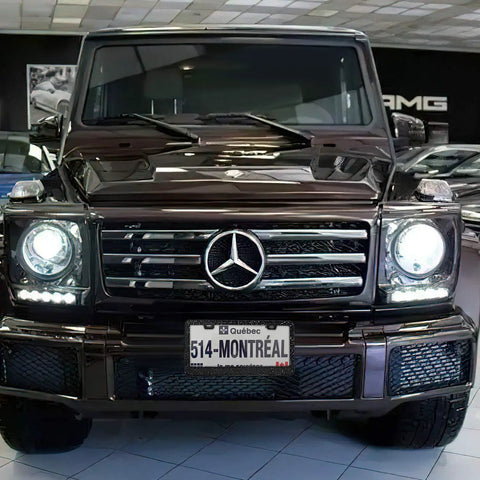 Front view of luxury SUV with Quebec license plate, showcasing elegant design and headlights