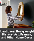 Person hanging mirror using Claw 65 Lb Drywall Picture Hangers With Spot Markers No Studs Needed 3 Pack Heavy Duty Hangers.