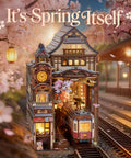 Cherry Blossom Sakura Train Book Nook Kit With LED 3D Wood Puzzle And Infinity Mirror in spring-themed setting