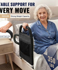 Senior using Bed Assist Rail For Seniors Easy To Use And Safe With A Non Slip Grip Handle For Sit Up And Stand Helps Prevent Roll Offs