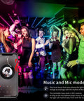 People dancing with 60Ft Bluetooth LED Strip Lights With Music Sync, visible on walls, app on phone showing music control feature.