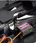 Close-up of One Tenth Scale RC Crawler Chassis Kit featuring micro servo, nylon frame, and gearbox components for DIY assembly.