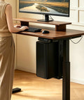 Heavy Duty Under Desk PC Mount Featuring Zero Drill Hassle For Adjustable Standing Workstations securely locks mid tower computer beside a desk.