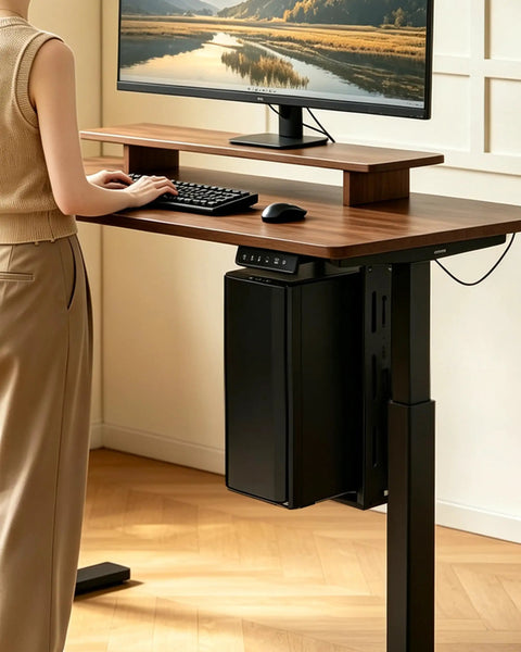 Heavy Duty Under Desk PC Mount Featuring Zero Drill Hassle For Adjustable Standing Workstations securely locks mid tower computer beside a desk.