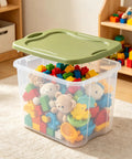 Hella Huge 95 Quart Clear Plastic Storage Bin With Super Grippy Handles For Organizing Bulky Seasonal Gear And Household Essentials, filled with colorful toys.