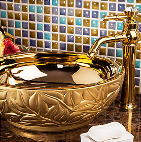 Super Slick Round Vessel Sink For Bathroom Vanity Killer Gold Ceramic Countertop Wash Basin with leaf design and faucet.