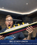 Man holding 32 Inch Remote Control Titanic Boat With LED Lights And 2.4 GHz Radio Large RC Cruise Ship for collectors