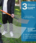 Person holding Wide 10-Tine Pitch Fork For Gardening And Farm Cleanup Heavy Duty Manure And Mulch Fork With Fiberglass Handle 45 Inch